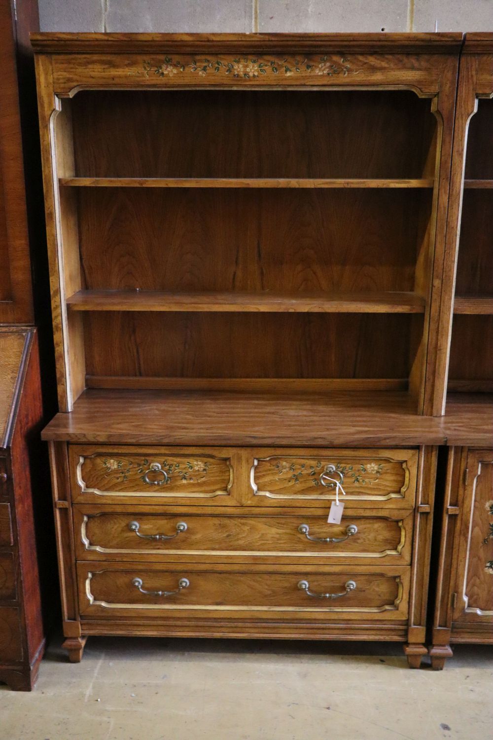 Three American stencilled walnut cabinets, total width 270cm, depth 44cm, height 181cm